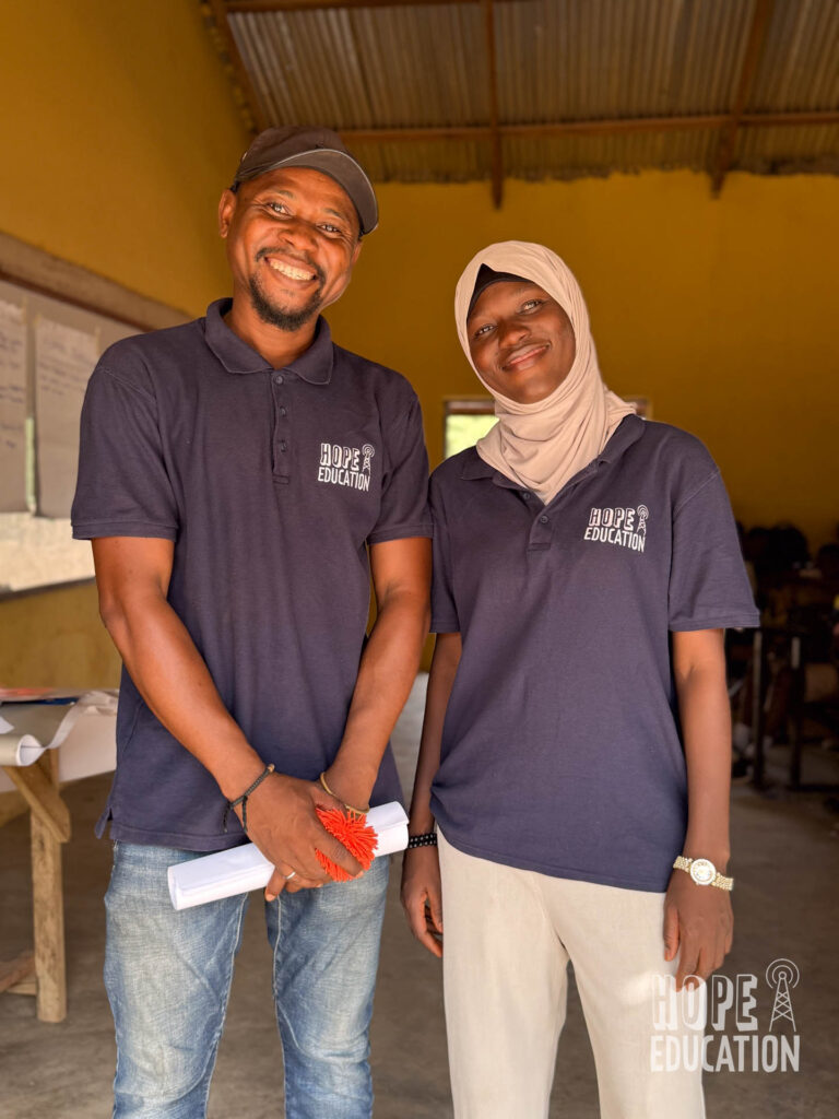 Co-facilitator Shaban Alhassan and Programs Manager, Mariama Adam deliver the human trafficking education pilot project in Tamale, Ghana in Dagbani