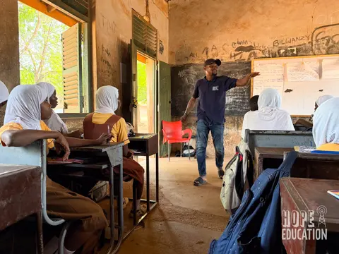 Delivering Module 1 of the Hope Education Project human trafficking education program in Tamale, Ghana