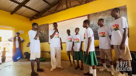 Students at St Pauls Junior High School acting out the human trafficking drama as part of the hope education project human trafficking education program for Tamale, Ghana