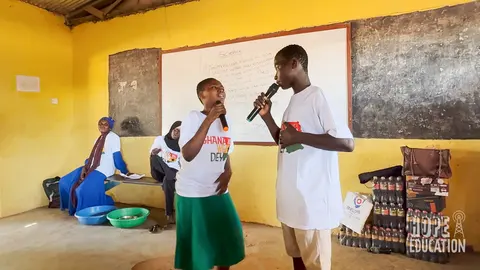 Students at St Pauls Junior High School acting out the human trafficking drama as part of the hope education project human trafficking education program for Tamale, Ghana
