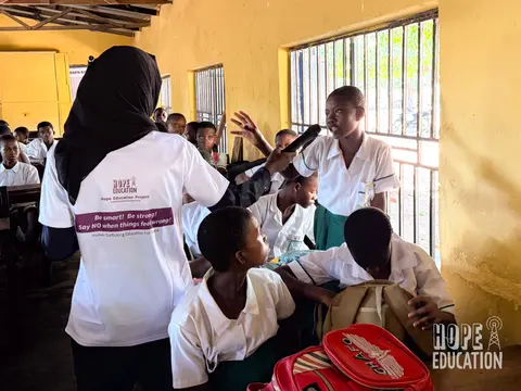 Students at St Pauls Junior High School answering Q&A's as part of the human trafficking drama as part of the hope education project human trafficking education program for Tamale, Ghana