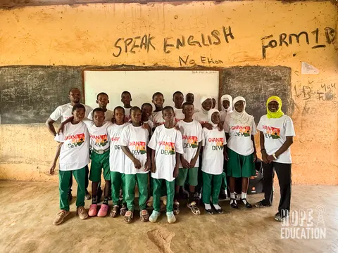 A group shot of the students at Darrul Haddis Junior High School acting out the human trafficking drama as part of the hope education project human trafficking education program for Tamale, Ghana