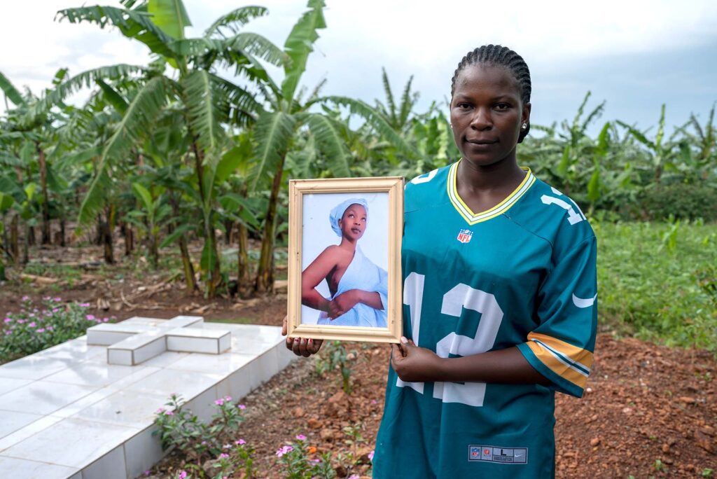 Ronah, Monic Kurunji's niece with Monic's picture in Uganda for the BBC Eye documentary #DubaiPortaPotty
