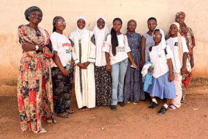Mariama Adam with girls for the SOMA Sisterhood Circle in July 2025